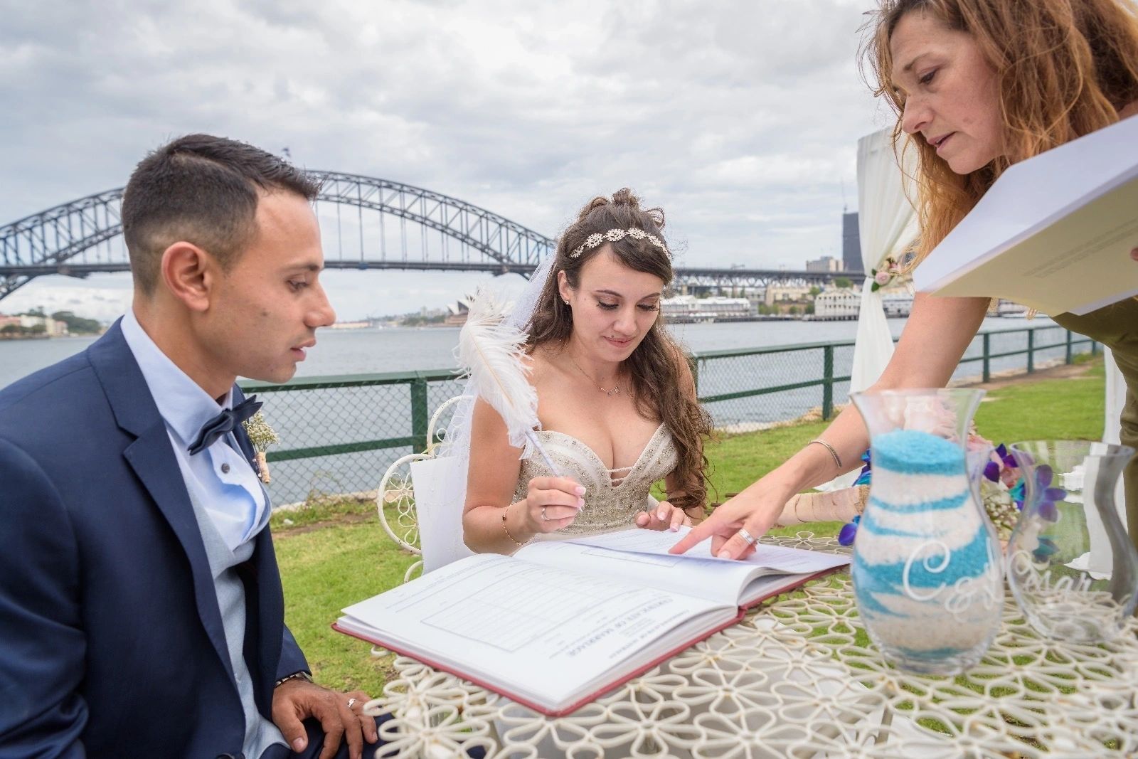 Beautiful wedding photo of couple with harbour bridge in the background at Clark Park Lavender Bay 